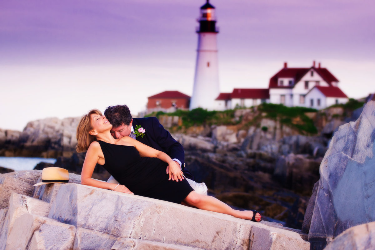 romantic photo of couple at lighthouse