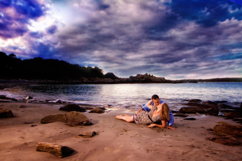 passionate engagement picture at beach in maine