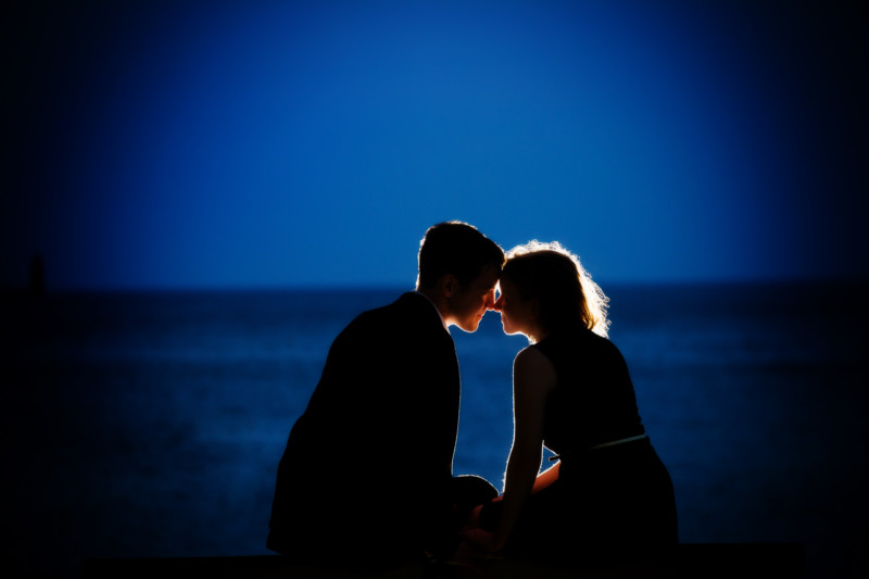 silhouette at night engagement picture