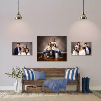 family portraits displayed in home over bench with pillows for maine family portraits