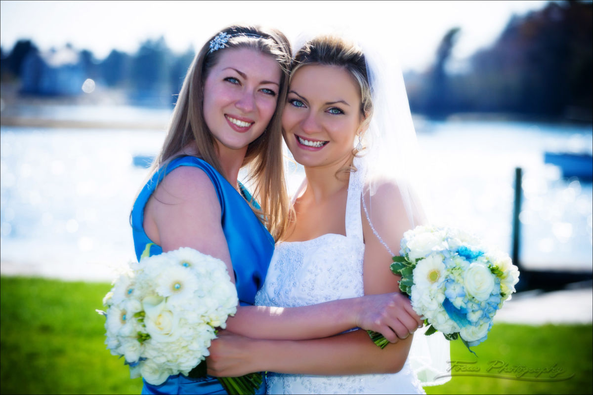 wedding photography of bride and maid of honor in kennebunkport, maine