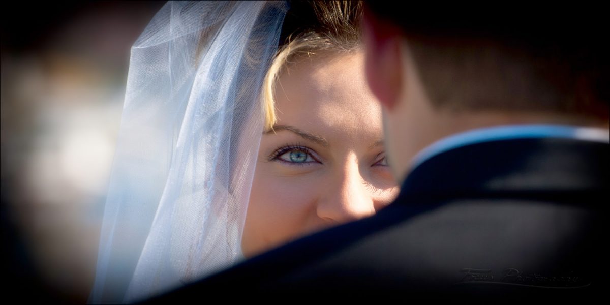 bride's eyes at wedding ceremony in Kennebunk, Maine