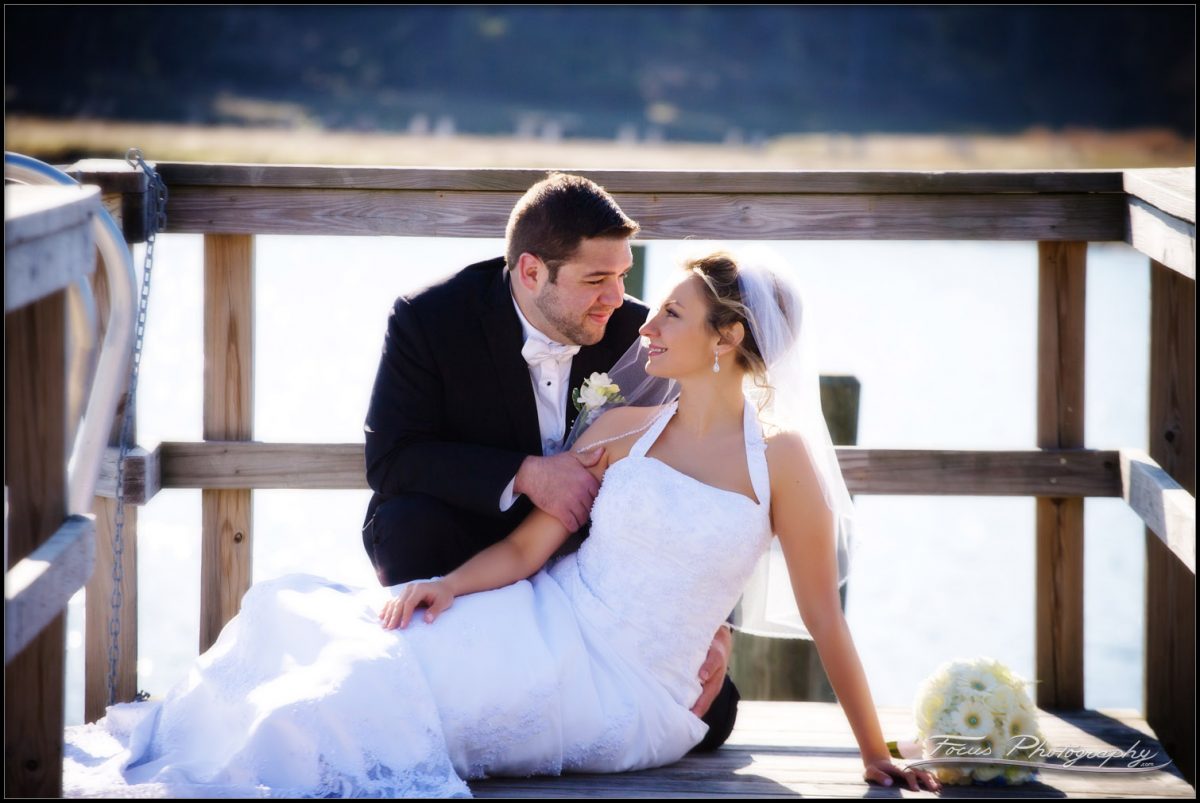 Bride and groom on the docks at Kennebunkport's Nonantum resort