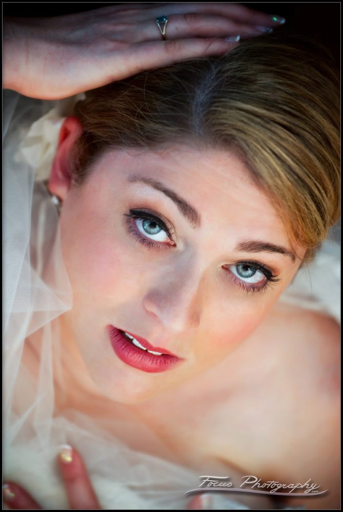 Bride on her wedding day with makeup, lipstick, and eye shadow