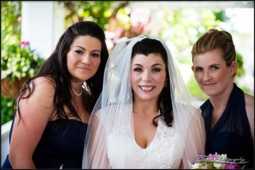 The two maids of honor with the bride