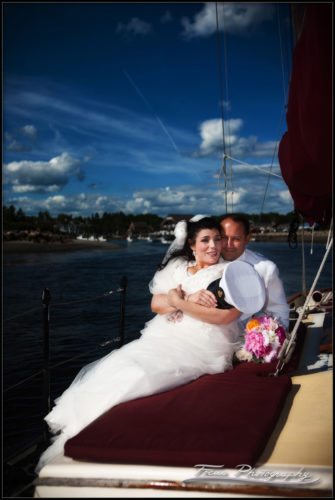 Bride and groom sailing into their wedding ceremony