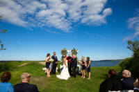 Wedding party in front of Casco Bay