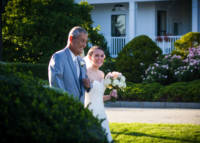 Dad walks bride down aisle on front lawn