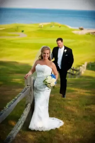 Bride and groom at Samoset Resort with ocean view in Rockport Maine captured by wedding photographer specializing in Midcoast and Maine weddings.