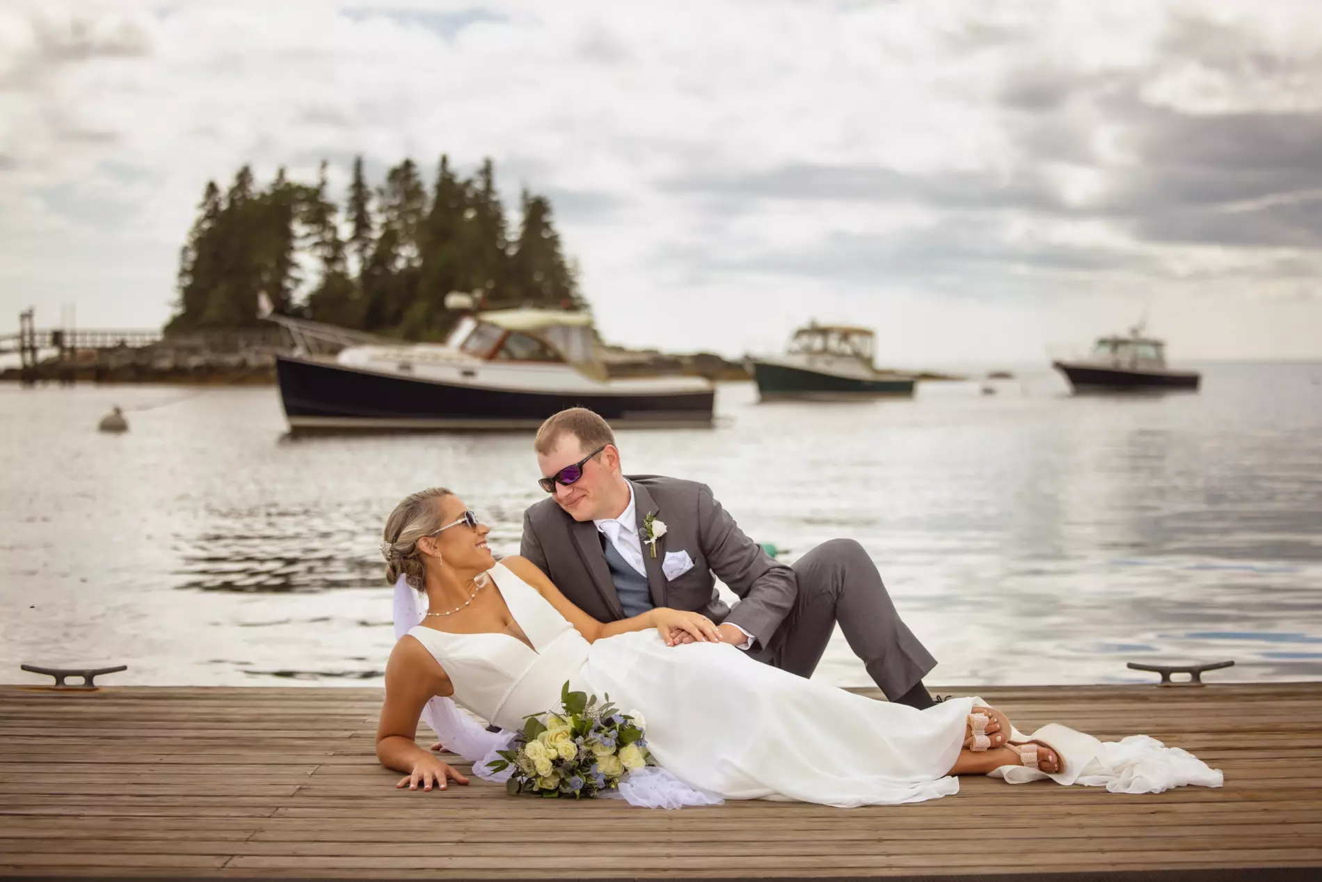 wedding couple on docks at newage seaside inn maine wedding