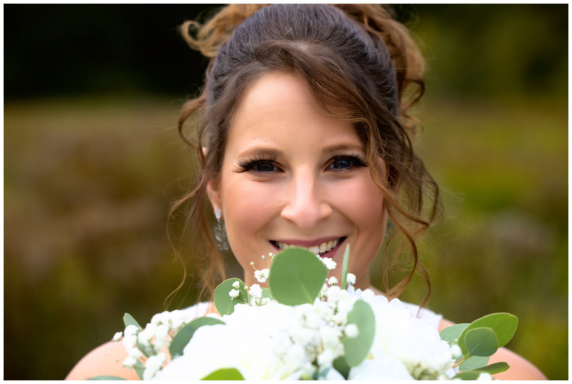 Bride emily and her bouquet on wedding dayl