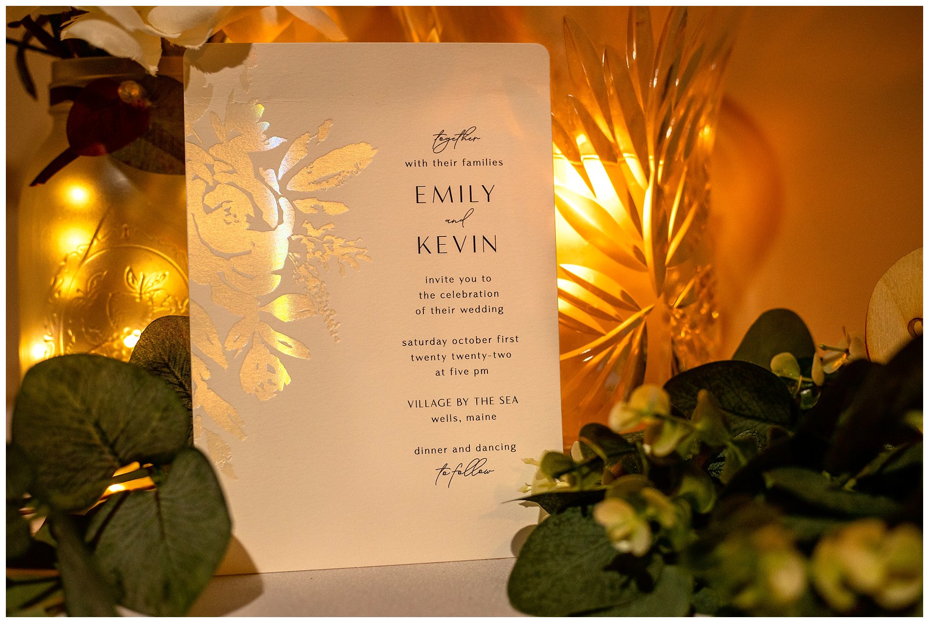 wedding invite lit by candlelight