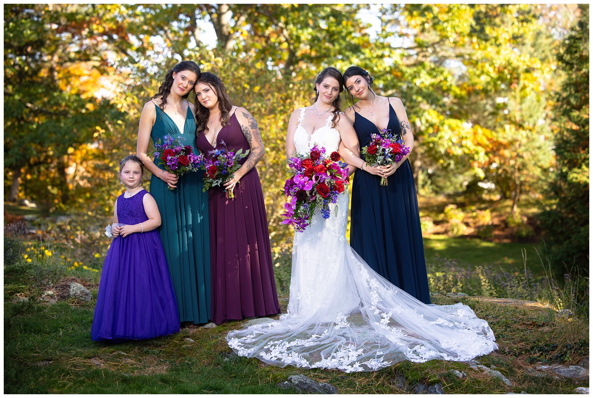 bridal party of bridesmaids and flower girl