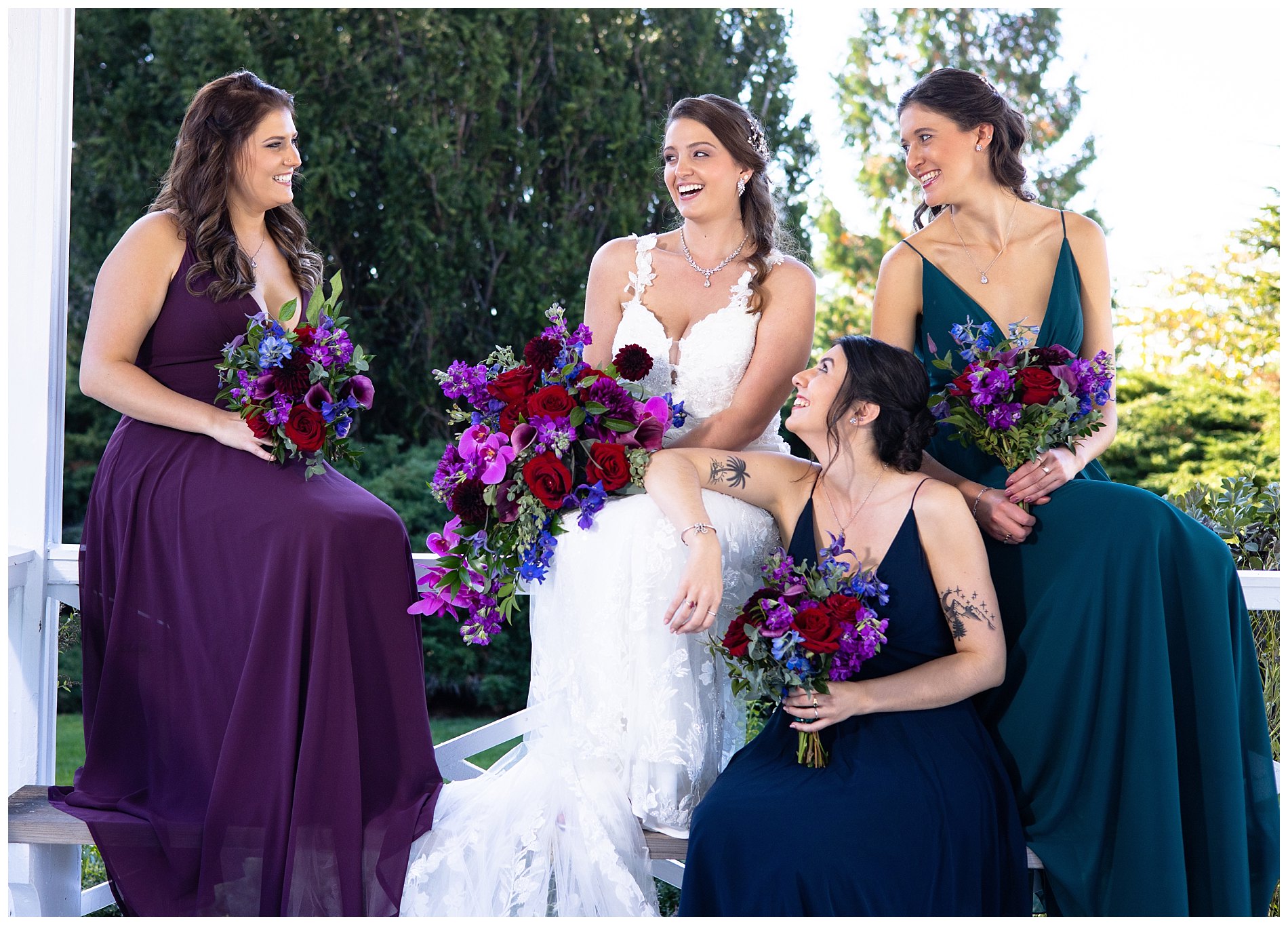 candid moment of bride and maids talking and laughing in gazebo at Wentworth by sea