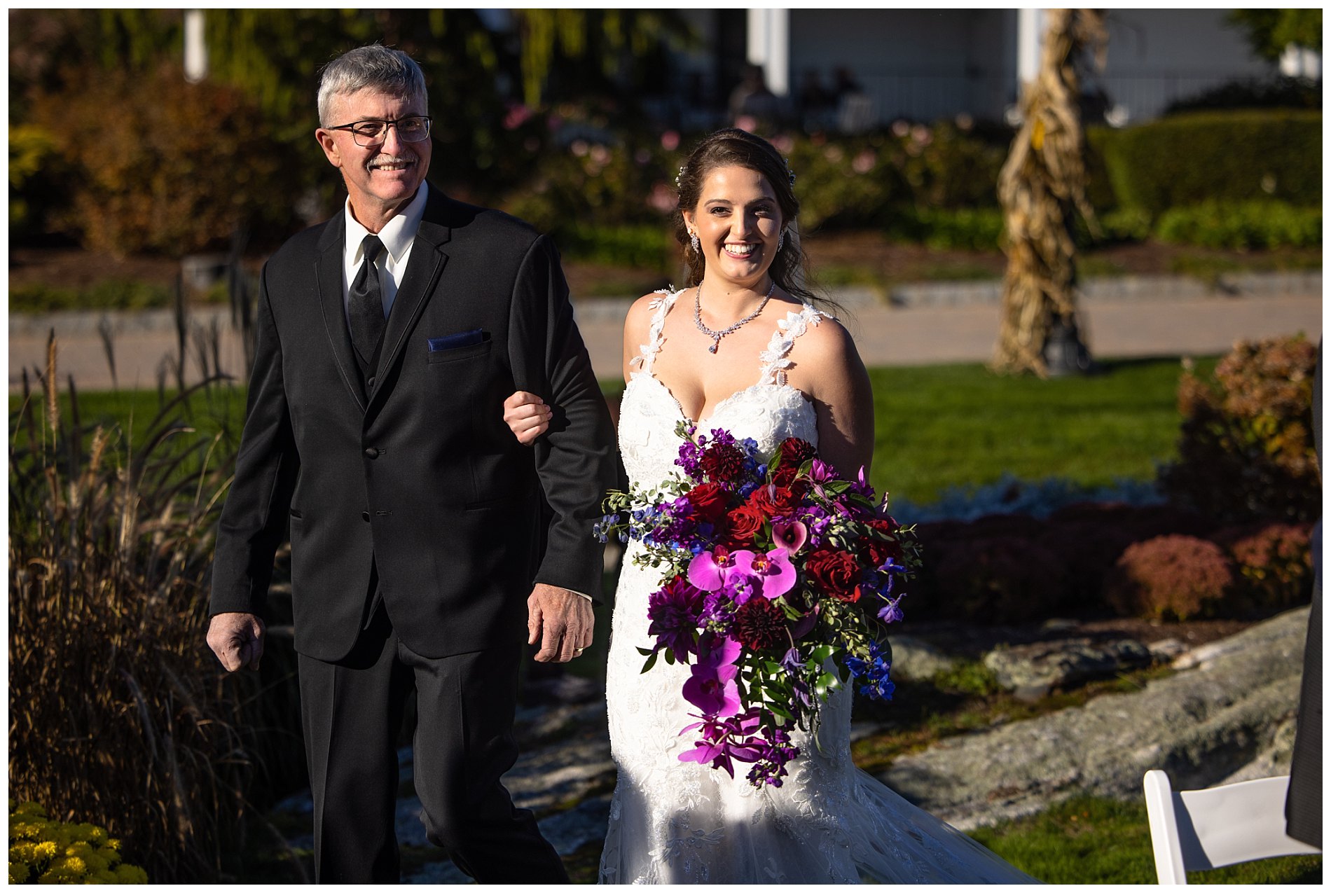 father of the bride walks daughter down aisle at wedding in New Castle, NH