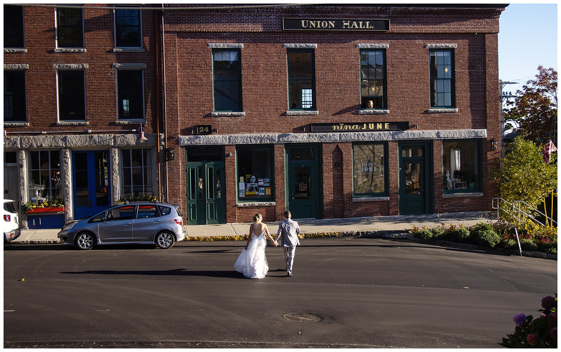 bride and groom enter union hall in rockport, me for wedding
