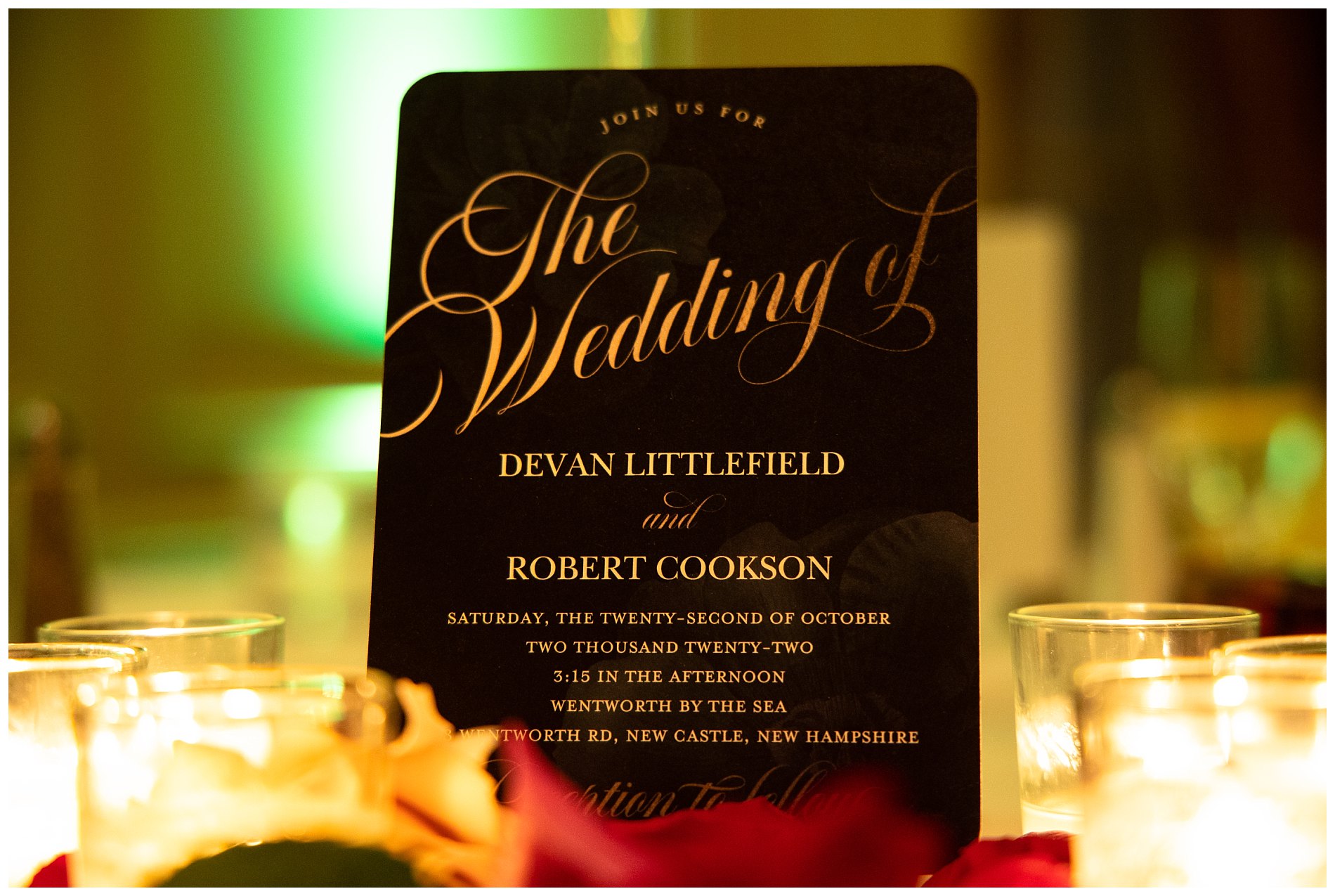 The wedding invite among candles at the event