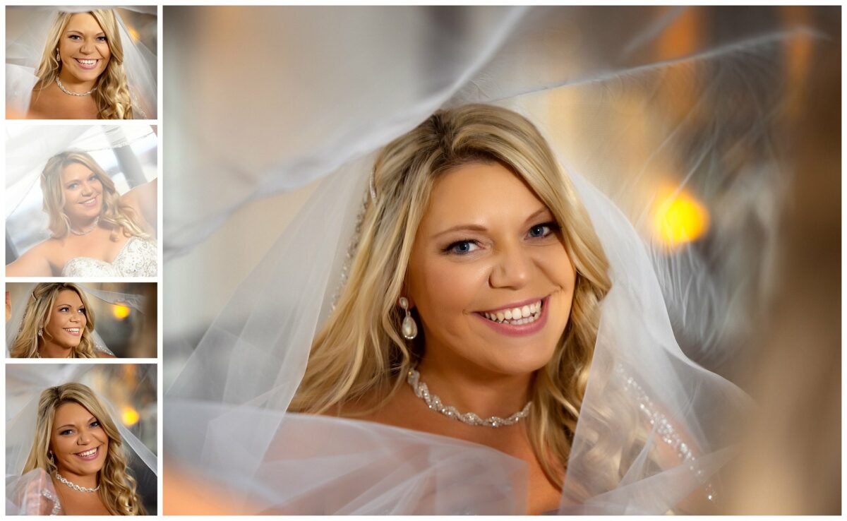 Close up of bride smiling inside veil