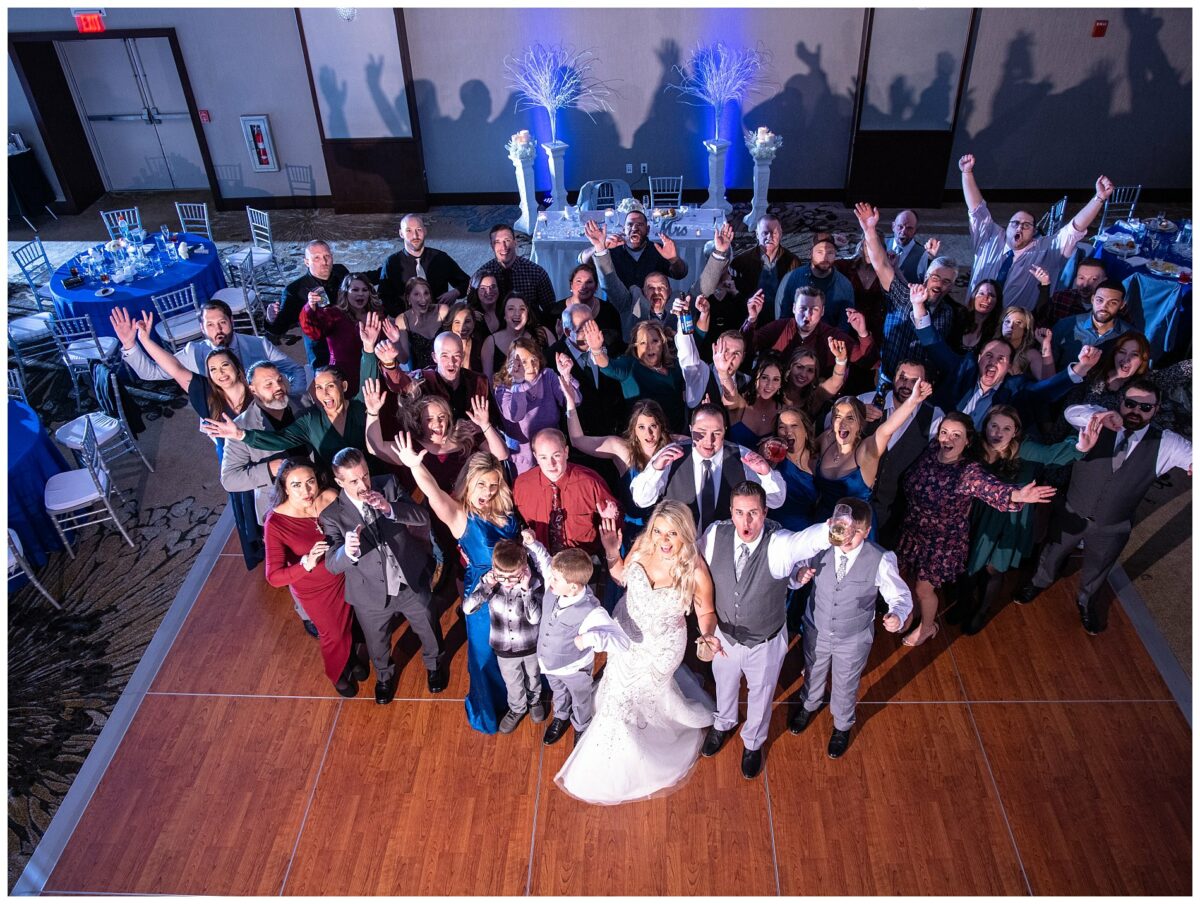 Everyone at the wedding on dance floor for one picture