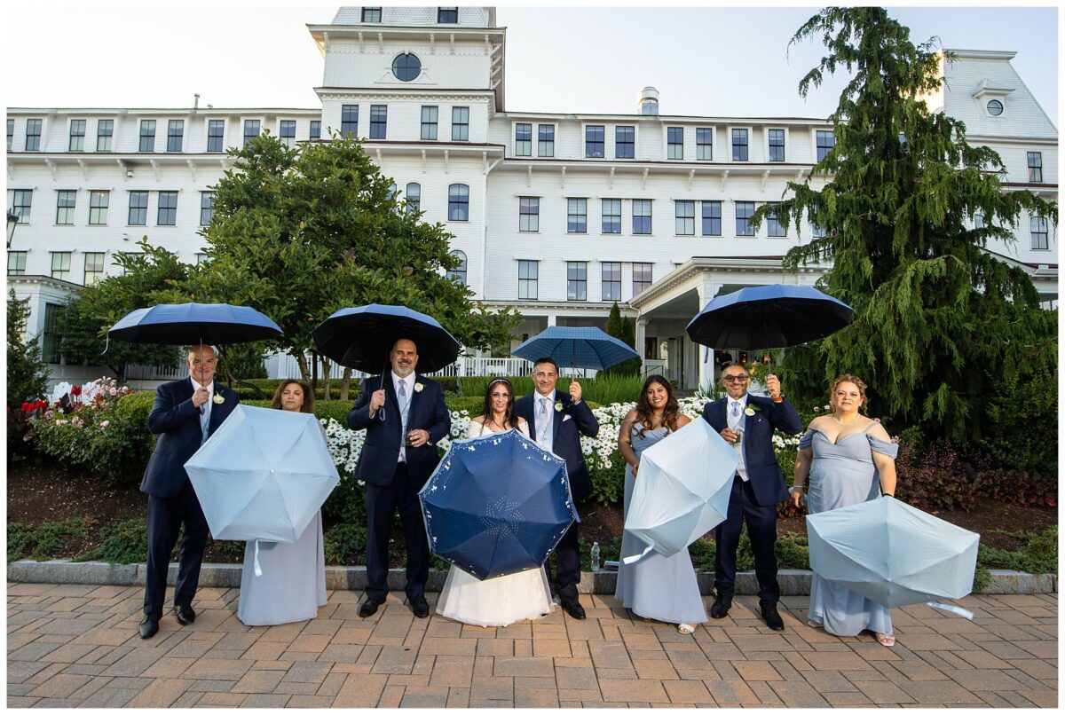wedding party with umbrellas
