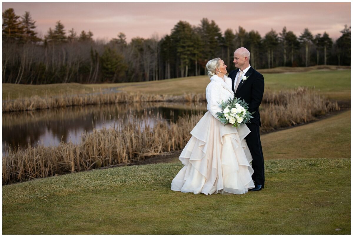 bride and groom on wedding day at wells golf course