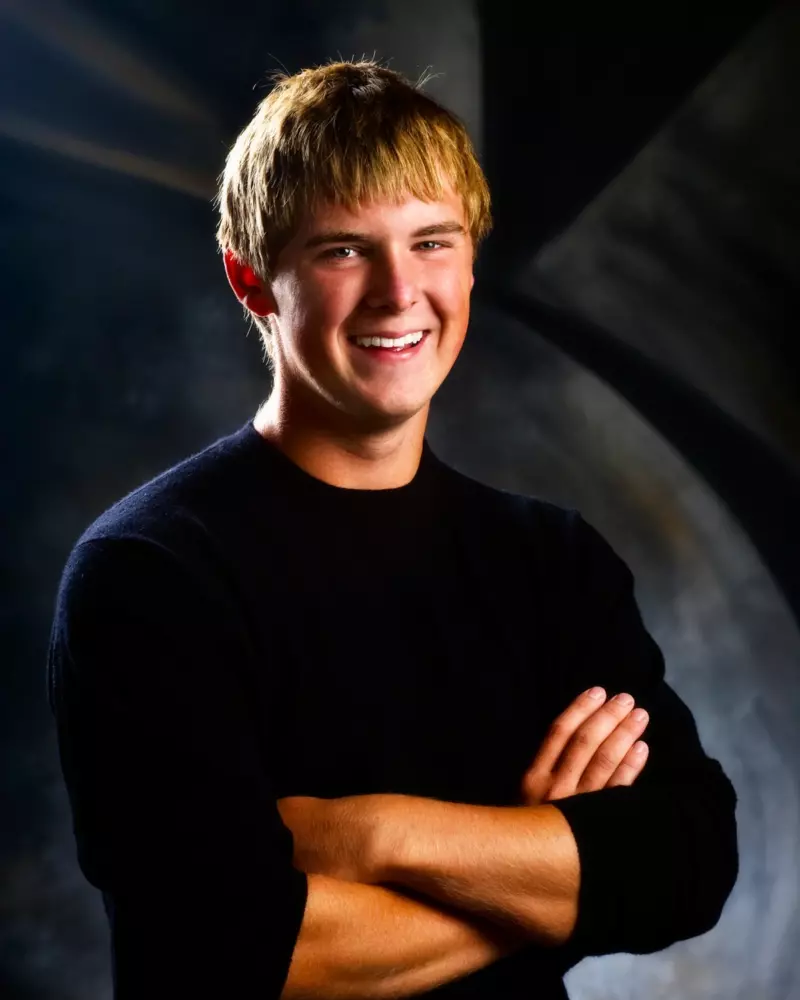 maine high school boy in photography studio for senior pictures