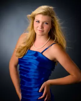 senior girl wearing party dress photographed in professional photography studio in maine