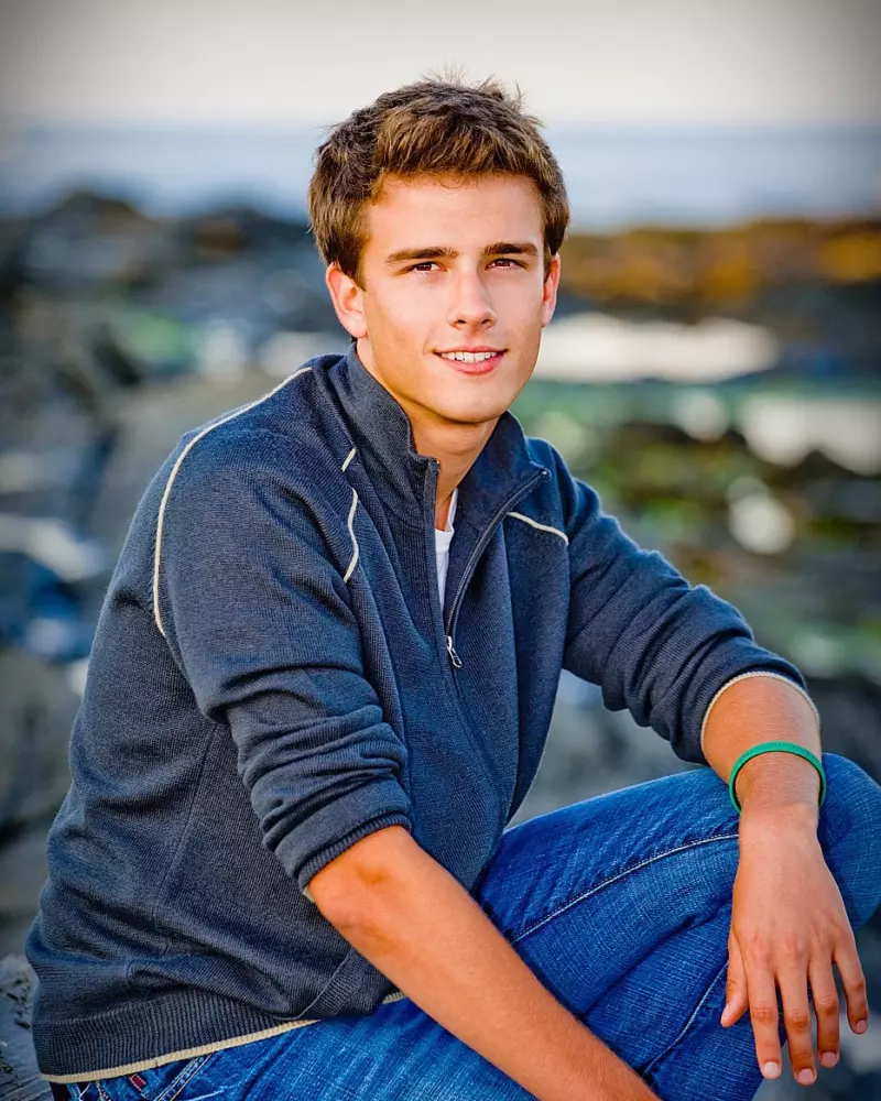 scarborough high school boy photographed at beach for senior pictures