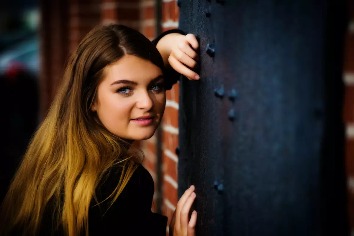 pretty high school student photographed in downtown portland maine for senior pictures