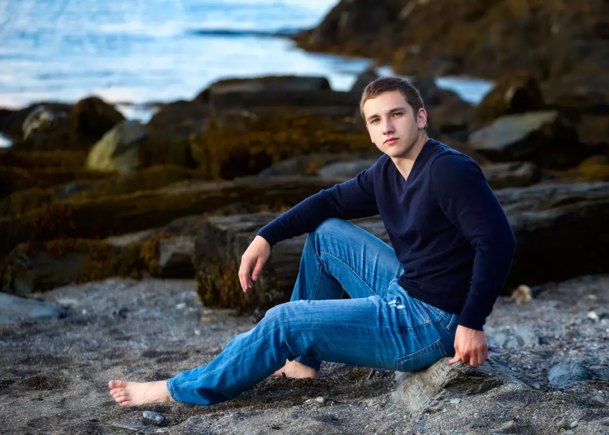 scarborough high school boy in professional senior photos in maine at the beach