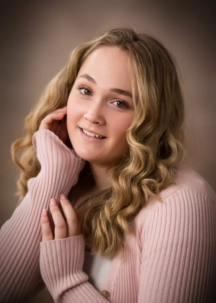 senior girl head shoot for graduation pictures in photography studio in maine
