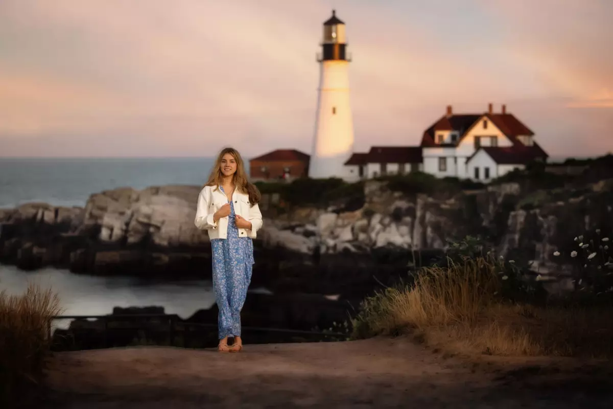 south portland high school senior girl photographed at light house at fort williams park in maine