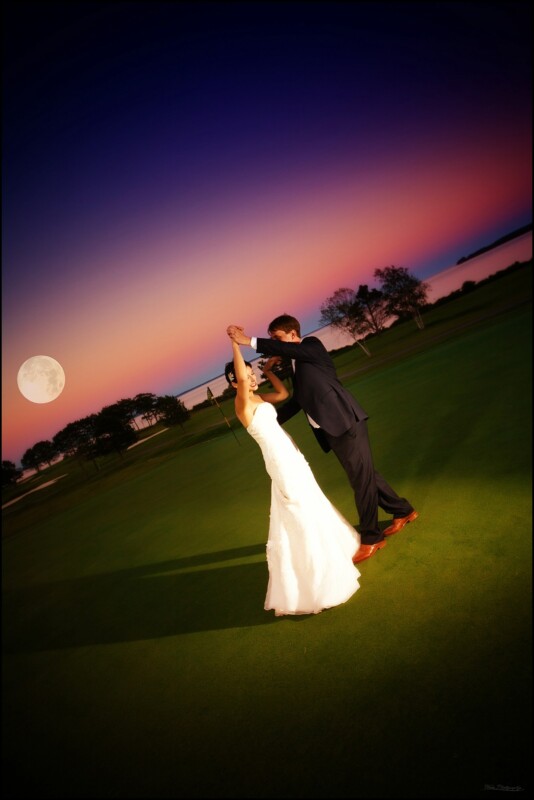 bridea and groom dancing on the golf course at twilight at samoset resort in rockport, me
