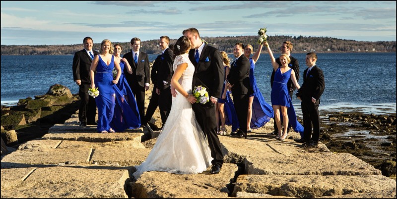 bride and groom on breakwater at samoset resort, rockport