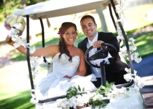 wedding couple melanie ben bride and groom in golf cart