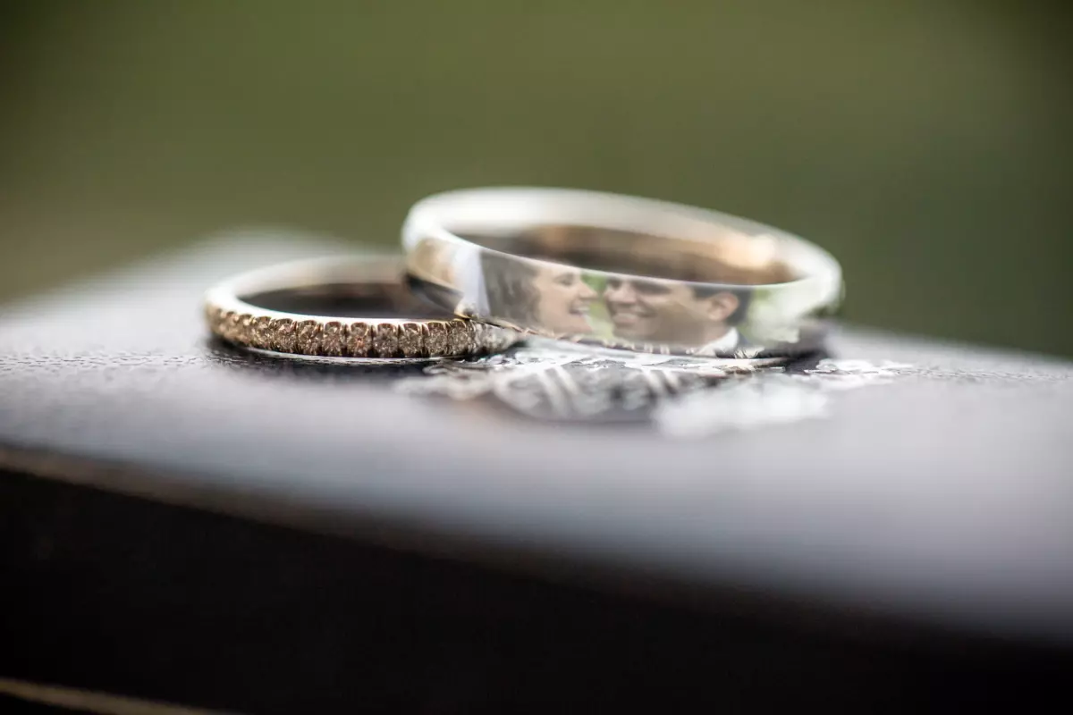 Couple reflected wedding rings