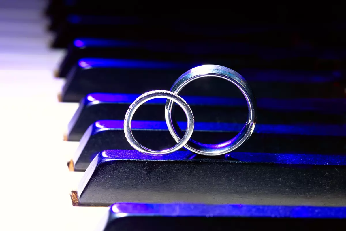 Wedding rings piano keyboard