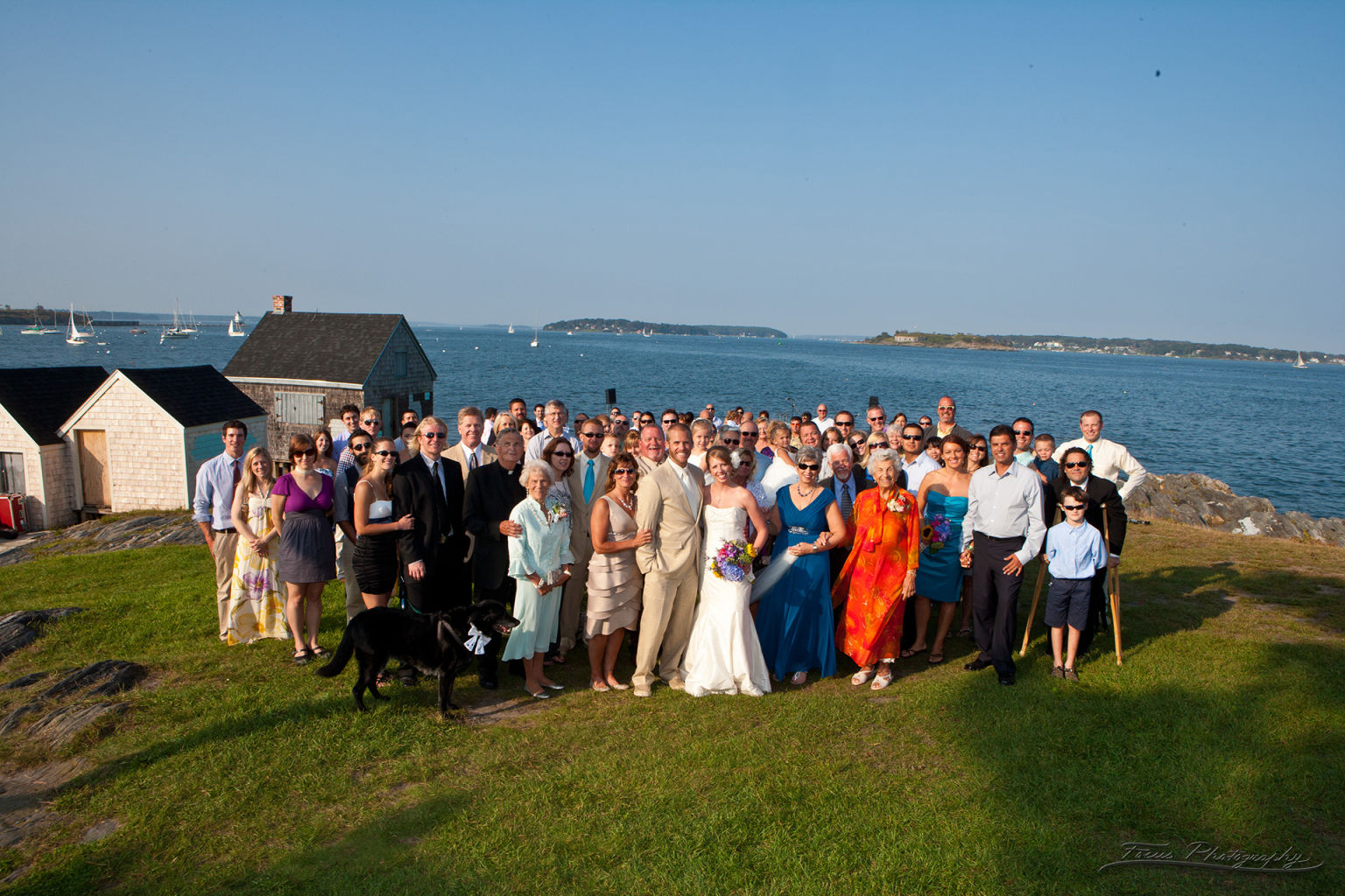 Large group shot at Maine ocean wedding