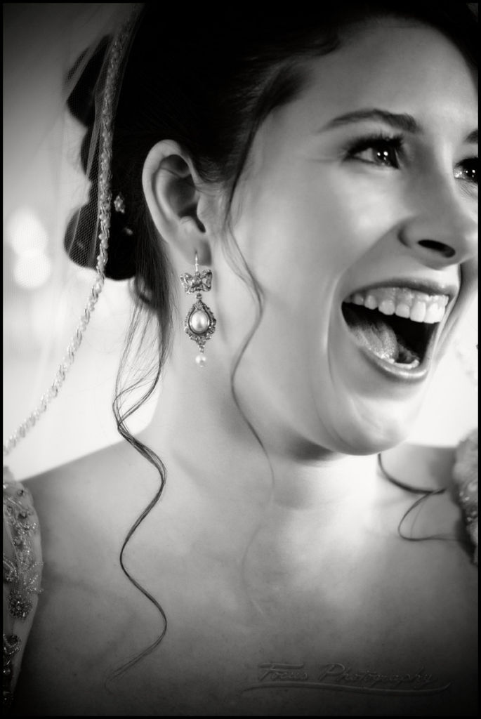 bride with bow earrings
