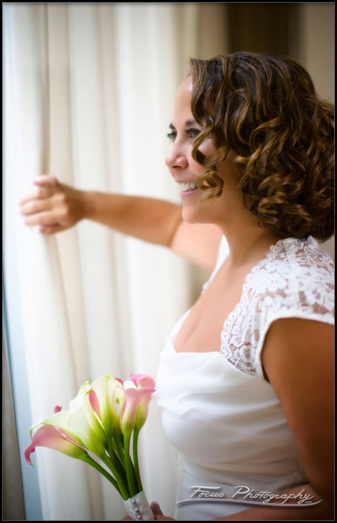 bride looking out at Portland Maine Wedding