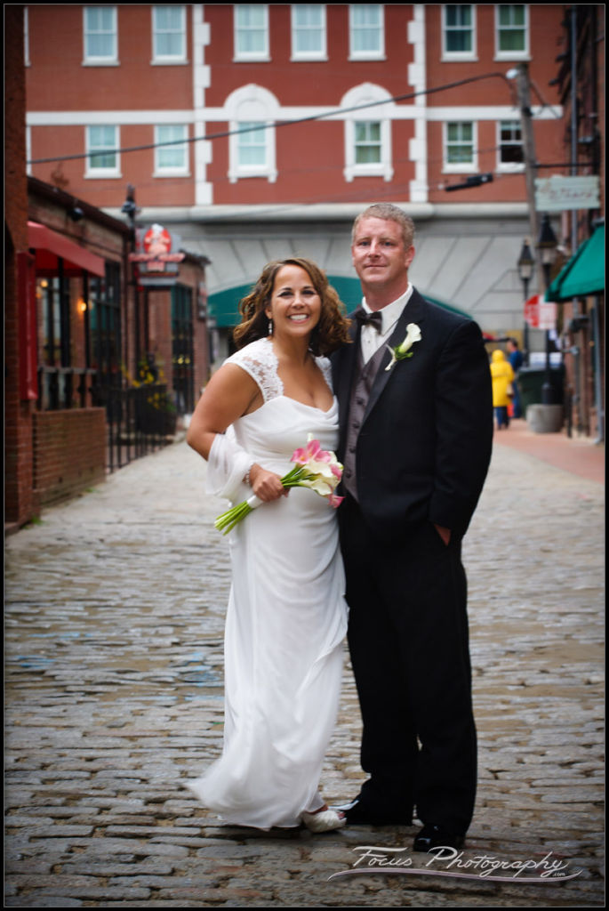 Full length image of a Bride and Groom on Wharf Street