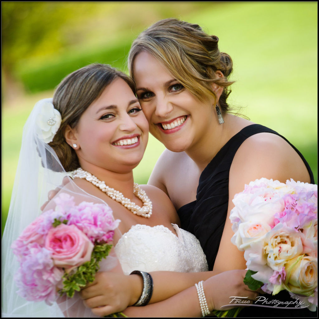 bride and maid of honor during wentworth wedding - photographers Will and Lucia of Focus Phtography