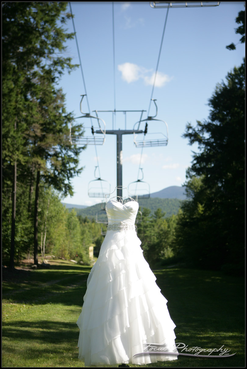 Gown under the chair lift at sunday river wedding