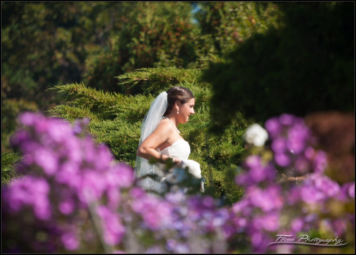 bride in flower gardens at wentworth by sea