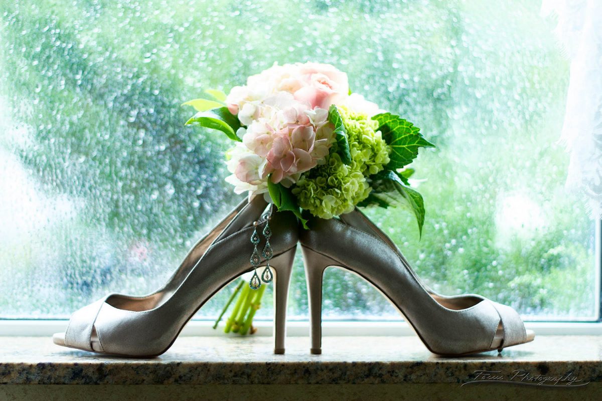 shoes and flowers at Freeport Hilton Garden Inn Wedding