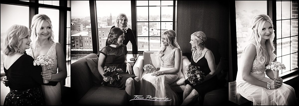 bride and friends at top of the east in Portland, Maine wedding