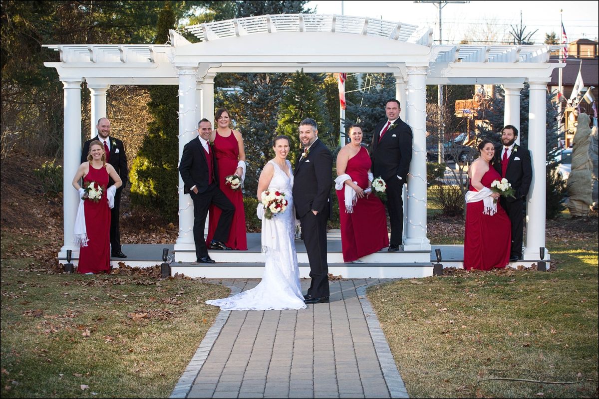  bridal party at pergola outdoors at  Village by the Sea wedding in Wells, Maine