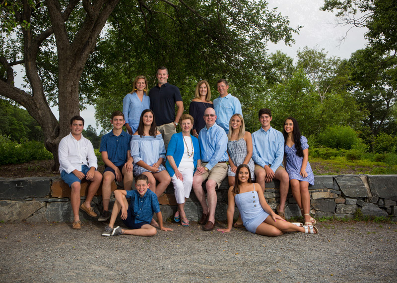 Family in blue and white photographed at park